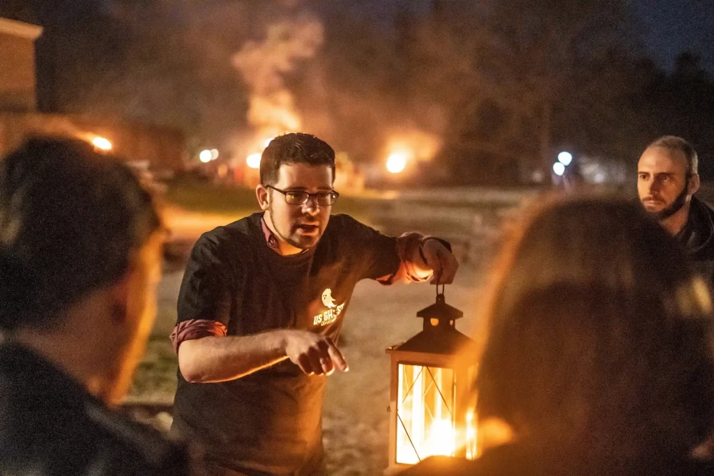 Guide telling ghost stories to guests