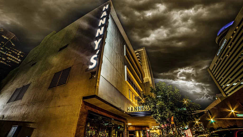 A tall building under an ominous sky